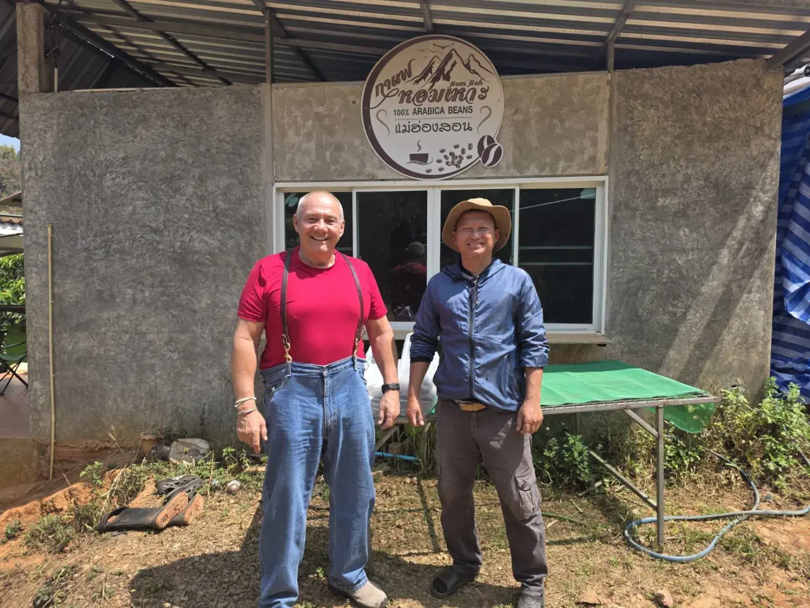 Jack and Manap standing together at the HomHoh Coffee farm
